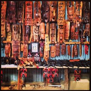 Wooden masks for sale at the City Market.